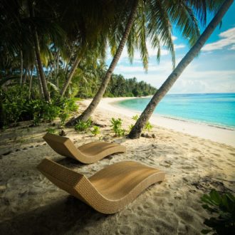 Each Bungalow has a private space on the beach with chaise lounges for soaking up the views of the bay right out front.