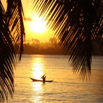 Mentawai kayaking on local boats